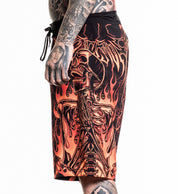 Infernal Nightmare Boardshort with fiery skeleton graphic, made of 92% polyester and 8% spandex 4 way stretch fabric.